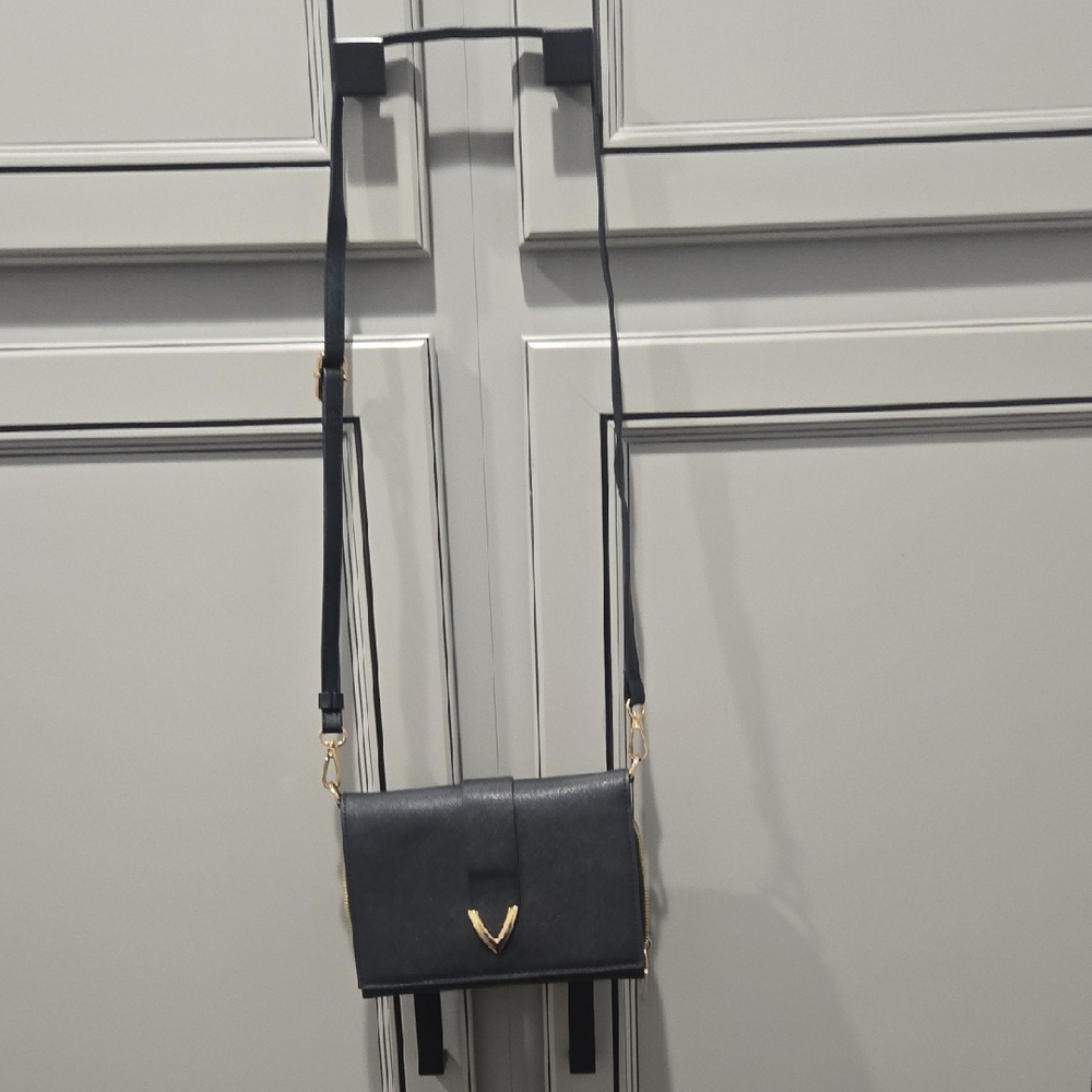Chic Black Crossbody Bag with Gold Detail